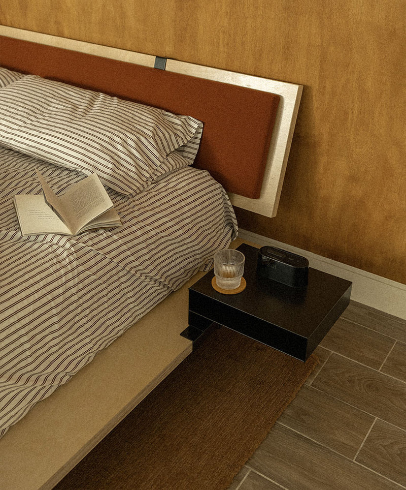 Customize your bed with modular add-ons. Pictured: The Bedside Storage Table Add-On attached to a Floyd Bed – Original.