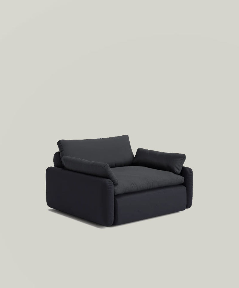 The Sink Down Lounge Chair in 'Deep'.
